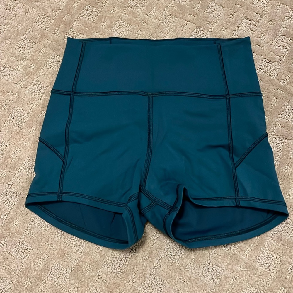 Size 4 Lululemon yoga shorts turquoise/teal